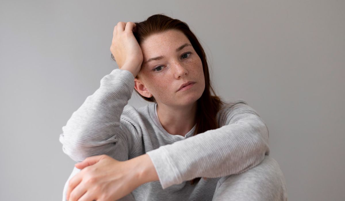 Image of an anxious woman.